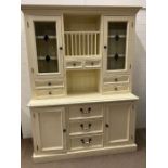 A painted dresser with glazed doors, plate rack, cupboard and drawers below (H210cm W160cm D59cm)