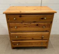 A pine chest of drawers (H82cm W81cm D43cm)