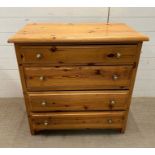 A pine chest of drawers (H82cm W81cm D43cm)