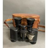 A pair of military binoculars made in France in leather case.