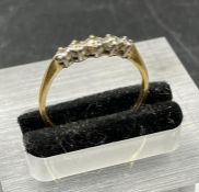 An 18ct yellow gold, five stone diamond ring (Total Weight 1.8g)
