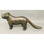 A Cast iron nutcracker in the form of a dog.