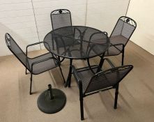 A garden Kettler table and chairs, mesh style with flower cartouche to top