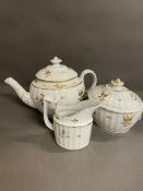 A Worcester Chamberlain teapot, sucrier and milk jug