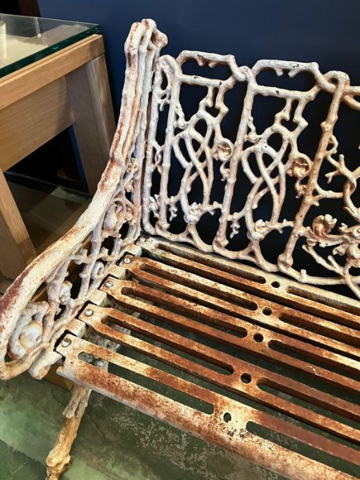 An architectural cast iron bench with vine pattern cast back, scrolling arms and iron slat seats, - Image 2 of 18