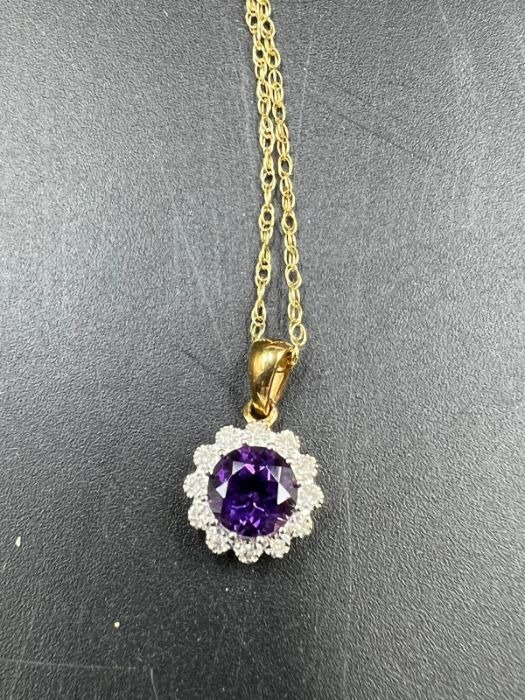 A 9ct gold necklace with diamond and semi precious stone pendant (Total Weight 1.6g) - Image 3 of 5