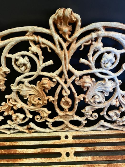 An architectural cast iron bench with vine pattern cast back, scrolling arms and iron slat seats, - Image 16 of 18