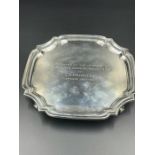 Engraved silver tray on four shell feet by Hyghpoint Import and Export Ltd, hallmarked for