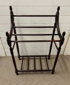 A Victorian mahogany clothes rail on turned supports