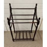 A Victorian mahogany clothes rail on turned supports