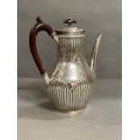 A Robert Harper silver coffee pot, engraved armorial Brackenbury, hallmarked for London 1879 (