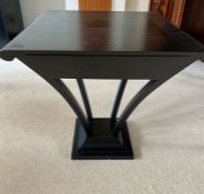 A black side table with drawers to centre on four tapering supports on square base (H61cm Sq60cm)