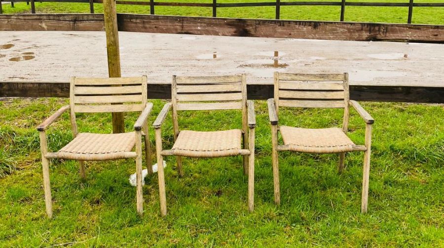 Three wooden and wicker garden chairs