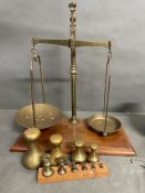 A set of Antique weigh scales by M A Webb of London with assorted weights up to 7lb.