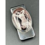 A silver and enamel nude money clip