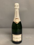 A Bottle of Louise Roederer Carte Blanche Champagne