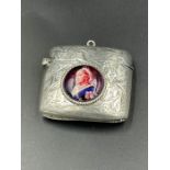 A hallmarked 1898 silver vesta case with enamel Queen Victoria