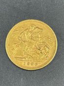 An 1896 gold half sovereign coin.