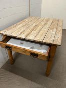 A distressed pine farmhouse kitchen table with drawer to end (H72cm W118cm D86cm)