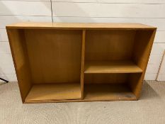 A teak wall unit with shelves (H69cm W110cm D28cm)