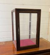 An oak display cabinet