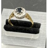 An 18ct gold sapphire and diamond ring, size Q, total weight 3.5g.