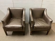 A pair of lounge chairs by R. Griffiths Woodwear Ltd