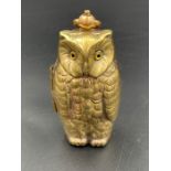 A brass double sovereign case in the form of an owl