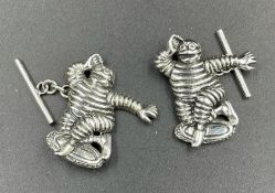 A Pair of sterling silver Michelin man cuff links