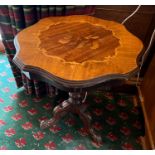 A marquetry occasional table with carved down swept legs (H54cm Dia54cm)