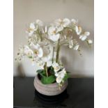 Faux orchids and pot