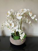 Faux orchids and pot