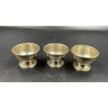 Three Sterling silver Tiffany & Co egg cups.