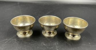Three Sterling silver Tiffany & Co egg cups.