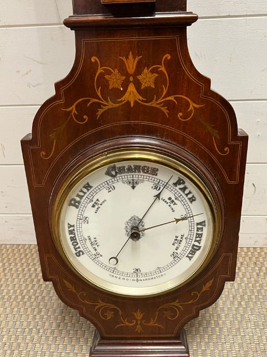 An inlay mahogany wheel barometer