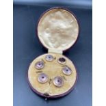 A cased set of Gents vintage shirt buttons, cased.