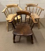 Three smokers bow armchairs various ages