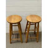 A pair of pine kitchen stools (H69cm)