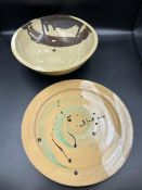 A studio pottery bowl and plate stamps to base