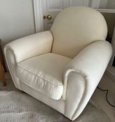 A white Easy armchair