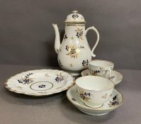 A Worcester porcelain coffee pot c.1785 9.25" high, a tea cup and saucer, tea bowl and saucer and