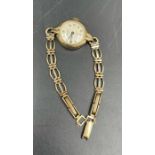 A 9ct gold Enicar ladies wristwatch (Total Weight 14.9g)
