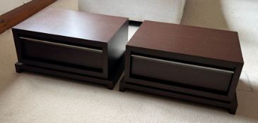 A pair of Italian style side cabinets or bedsides with push open drawers