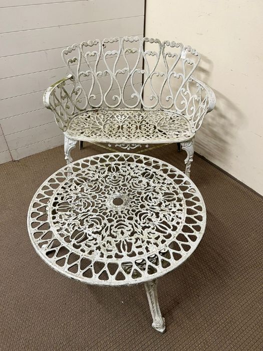 A white metal garden bench with circular coffee table (Bench H82cm W96cm D43cm)