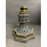 A Lambeth Doulton stoneware candlestick