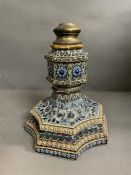 A Lambeth Doulton stoneware candlestick