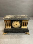 Wooden mantle clock with gilded columns, feet and handles