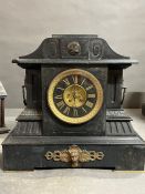 A French marble mantel clock with cast metal mashed handles