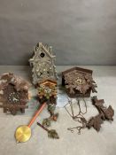 A selection of four various Cuckoo clocks AF