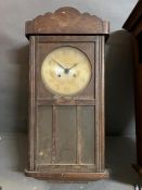 An oak wall clock